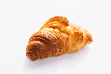 Delicious snack croissant on white background