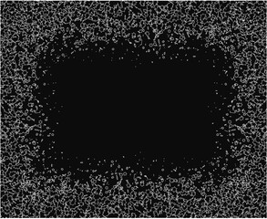 A black background with white dots. The dots are scattered all over the background. The background is empty and has no other elements