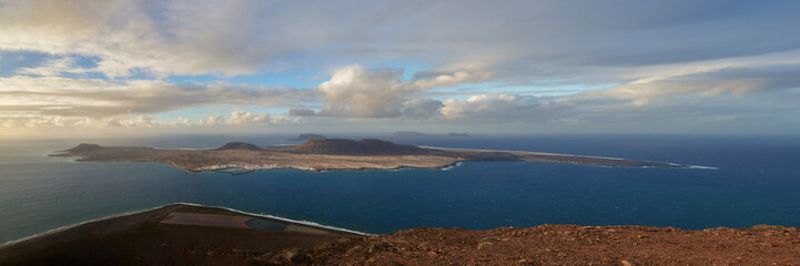 Sunset from a panoramic viewpoint Mirador del Rio above the island of Graciosa in Lanzarote, Spain