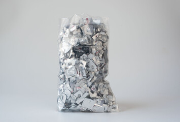 Orphan waste. A clear plastic bag filled with empty aluminum blister pack scraps, highlighting...