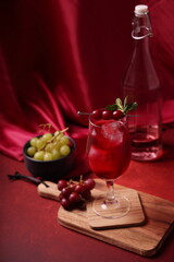 Red wine cocktail with grapes