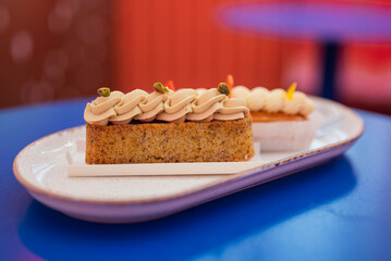 delicious dessert eclair cake with cream in a restaurant