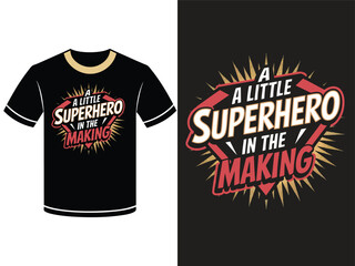 A black t-shirt graphic design with a bold, vintage-style graphic of a superhero symbol featuring the phrase "A Little Superhero in the Making