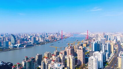 4K time lapse Aerial view of Shanghai financial district with the Winding Huangpu River