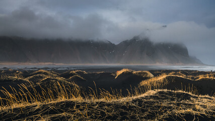 Iceland's diverse landscape features majestic mountains, dramatic coastlines, glaciers, and...