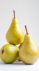 Three Ripe Pears Balanced on White Background