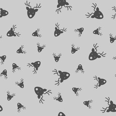 Fototapeta premium Deer head with antlers solid seamless pattern, happy christmas theme. Vector graphics. Forest deer animal face sign background, filled with glyphs icon.