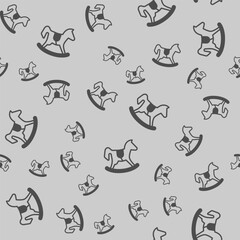 Wooden horse toy solid seamless pattern, happy christmas theme. Vector graphics. Toy gift for children sign background, filled with glyphs icon.