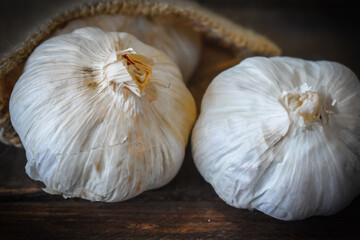 Garlics on wooden table
