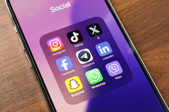 Poznan, Poland - March 12, 2025: smartphone screen with top social media apps including instagram, tiktok, x, facebook, telegram, linkedin, snapchat, whatsapp and viber