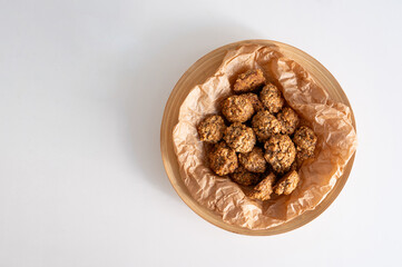 Homemade oatmeal cookies are lying on the plate. Homemade biscuits. Bakery. Vegetarian food. Healthy breakfast