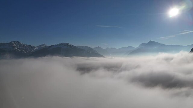 Fog over the mountains. Aerial View.