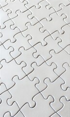 Blank white jigsaw puzzle pattern as a mockup background, top view. (Puzzle)