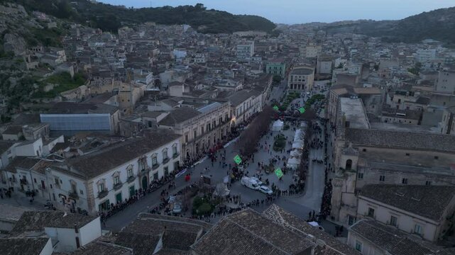 dusk flying counter clockwise around Cavalcata in Scicli Sicily