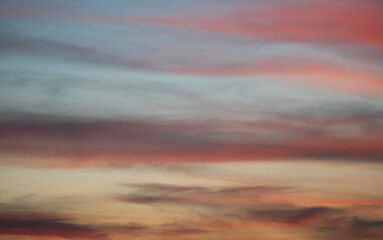 Beautiful bright evening sunset sky with dark  clouds. Sunset sky background.