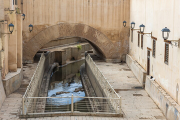 View Of Canal Canal Or Waste Disposal Sewer. Fez City. Morocco. Horizontally. 