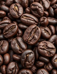 Obraz premium Dry, oily, rough, and slightly bumpy coffee beans with visible crevices, coffee beans, macro, detail