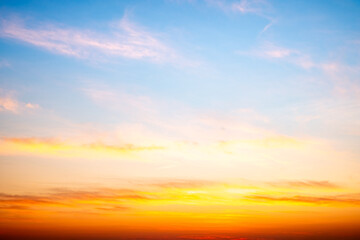 Beautiful , luxury soft gradient orange gold clouds and sunlight on the blue sky perfect for the background, take in evening,Twilight, Large size, high definition landscape photo