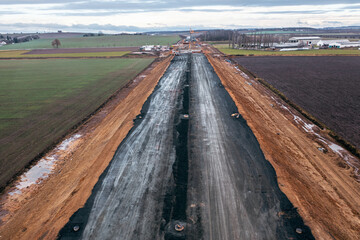 Earthworks on the highway during spring and rainy weather.