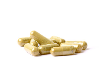 Ginger powder in capsules. isolated on white background.