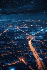 Nighttime cityscape with illuminated roads and skyline