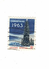 A vintage Christmas postage stamp from the USA on a white background.