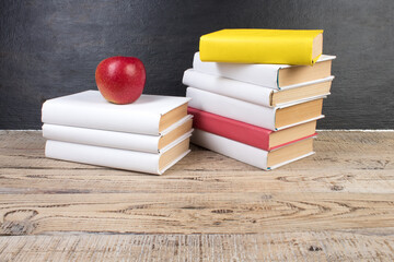 Books, books on the background school board. Back to school. Education. Copy space for text.