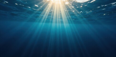 Obraz premium Dark blue ocean surface with sunlight filtering down, wave reflection, dark blue water