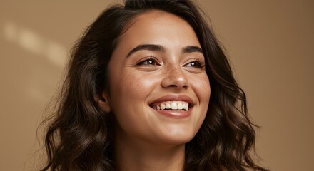 Naklejka premium A Smiling Beautiful Woman with Freckles and Dark Curly Hair