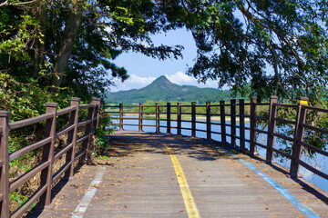 Obraz premium Shaded Wooden Bridge on the Yeongsangang Bike Path