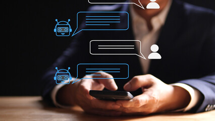 Concept AI Chatbot, Artificial Intelligence, digital chatbot, robot, application, conversation assistant. Businessman using mobile smartphone with AI chatbot assistant for customer service support