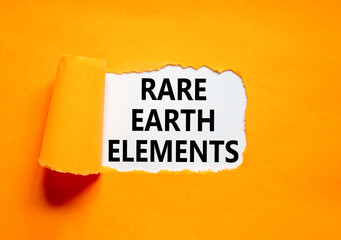 Rare earth elements symbol. Concept words Rare earth elements on beautiful white paper. Beautiful orange paper background. Business and rare earth elements concept. Copy space.