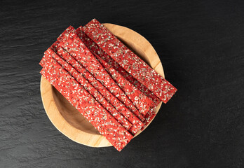 Beetroot crackers, thin rusk beet root bread, red diet multigrain crispbread, various seeds