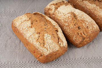 Whole wheat brown bread, fitness pumpkin carrot buns with seeds, cereal bread grain bun