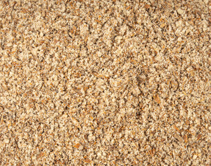 Milk thistle seeds powder, crushed silybum marianum grains pile, milled dry blessed milkthistle
