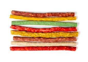 Rawhide chew sticks for dogs, colorful collagen dog food, pressed dry kibble, dental care treats