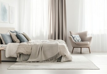Calm bedroom interior with beige bed, armchair, and rug.