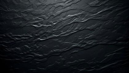 Fototapeta premium Black textured surface with wavy patterns accentuating depth 