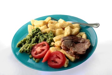 turkey meat slice  with vegetables and noodles for dinner