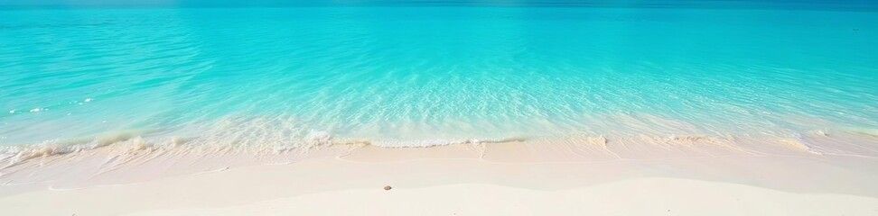 Crystal clear blue water lapping on white sandy beach, perfect for summer vacation, ocean, serene