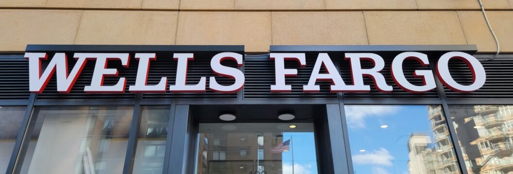 Wells Fargo bank signage on the building, NYC, USA. Photo by Artist Nadia Russ.