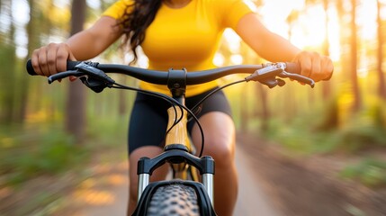 Woman Biking Through Sunlit Forest Trail: Outdoor Adventure and Freedom