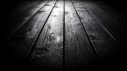 Dark wooden floor with light reflection.