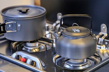 stainless steel pots on the stove