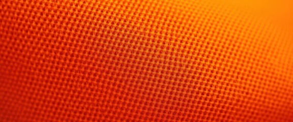 Close-up textured orange stockinet fabric background, background, handmade