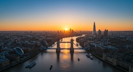 Aerial view of London at sunset with the Tower Bridge