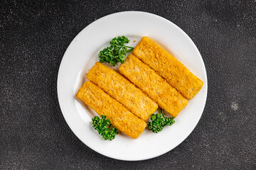 Fish sticks seafood dish fresh delicious gourmet food background on table rustic food top view copy space keto and paleo pescetarian diet