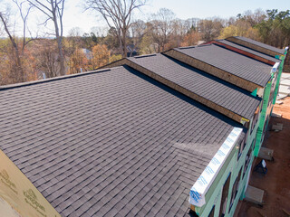 Sunny Daytime Drone Images of New Residential Townhouse Construction Featuring Architectural...