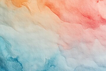 Abstract watercolor wash background in cool and warm tones.