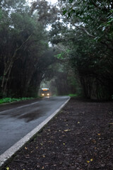 Obraz premium Bus driving along a mountain road in Anaga. Tenerife. Canary Islands